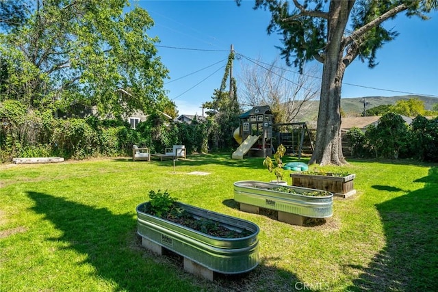 2082 Harris St, San Luis Obispo, CA 93401 - view of green lawn featuring a playground