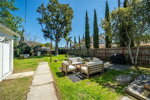 2082 Harris St, San Luis Obispo, CA 93401 - fenced backyard featuring outdoor lounge area and a patio