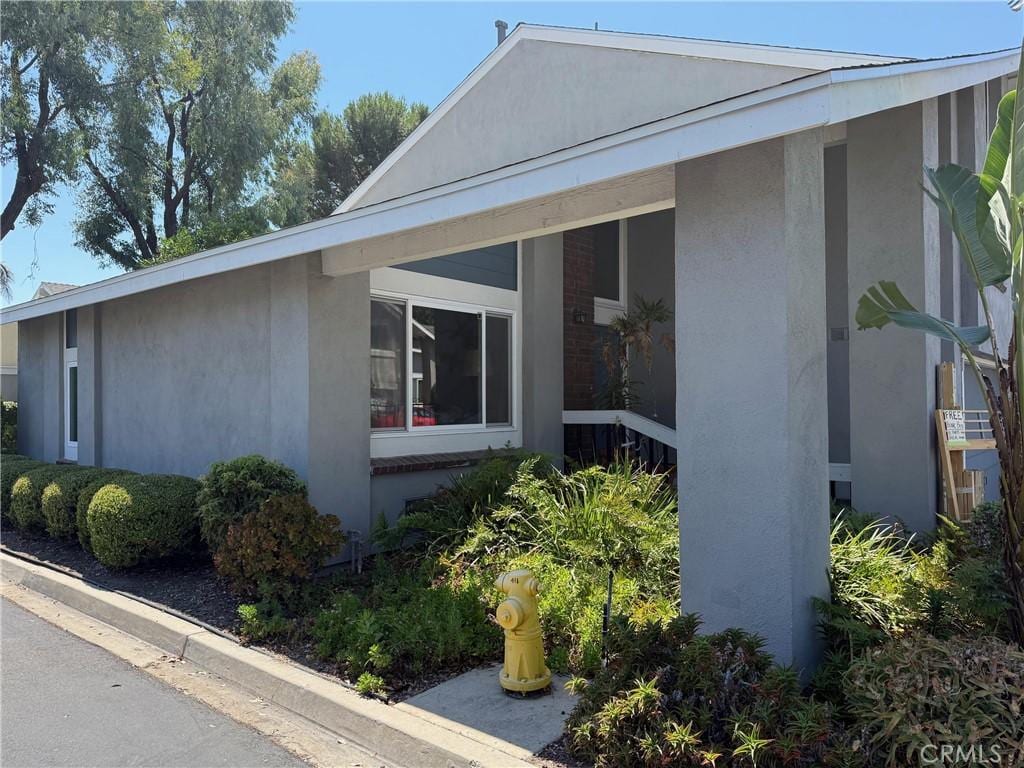 1 Buckeye, Irvine, CA 92604 - view of property exterior with stucco siding