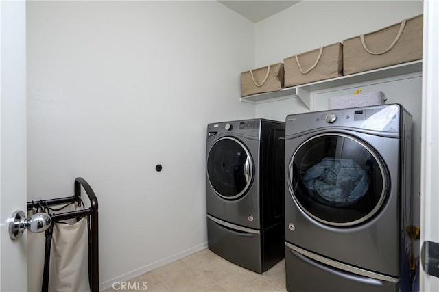 30159 Honor Ct, Menifee, CA 92584 - washroom with washing machine and clothes dryer and baseboards