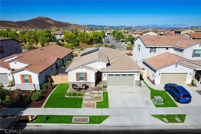 30159 Honor Ct, Menifee, CA 92584 - view of front facade featuring a residential view, driveway, an attached garage, a mountain view, and a tile roof