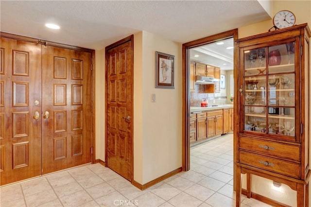 6272 Riviera Cir, Long Beach, CA 90815 - hallway featuring light tile patterned floors, a textured ceiling, and recessed lighting