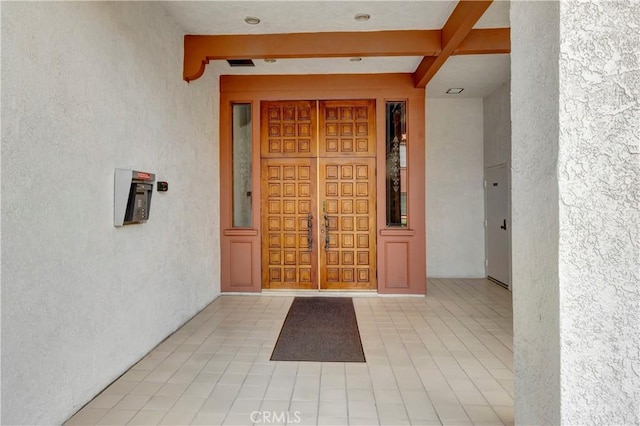 6272 Riviera Cir, Long Beach, CA 90815 - doorway to property featuring stucco siding