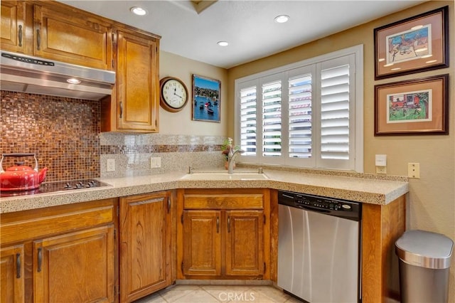 6272 Riviera Cir, Long Beach, CA 90815 - kitchen with dishwasher, under cabinet range hood, stovetop, tasteful backsplash, and light countertops