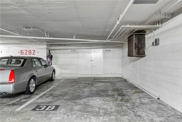 6272 Riviera Cir, Long Beach, CA 90815 - parking deck featuring concrete block wall