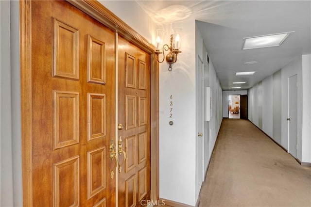 6272 Riviera Cir, Long Beach, CA 90815 - hallway with light carpet