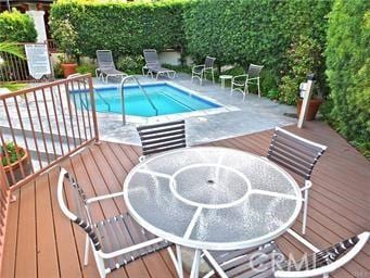6272 Riviera Cir, Long Beach, CA 90815 - view of swimming pool with a deck, a patio area, a swimming pool, and outdoor dining area