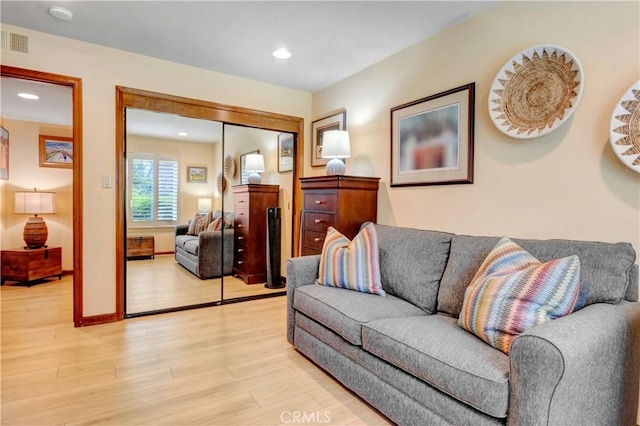 6272 Riviera Cir, Long Beach, CA 90815 - living area with light wood finished floors and recessed lighting