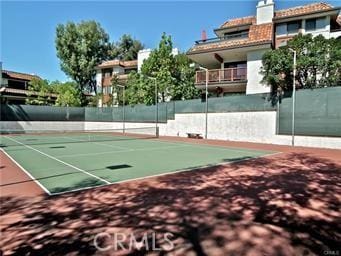 6272 Riviera Cir, Long Beach, CA 90815 - view of tennis court with community basketball court