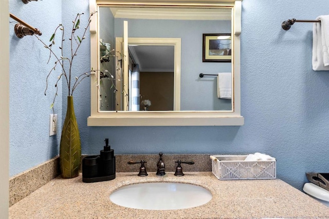 6636 Indian Cove Rd Unit 29, Palms, CA 92277 - bathroom featuring vanity and crown molding