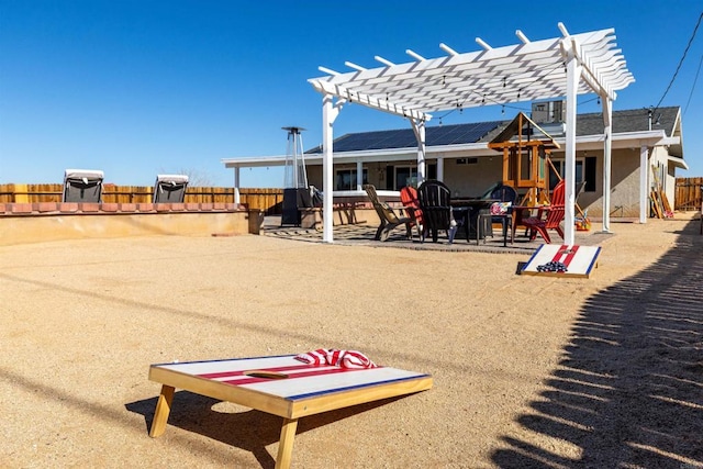 6636 Indian Cove Rd Unit 29, Palms, CA 92277 - view of community with a pergola, a fenced backyard, and a patio