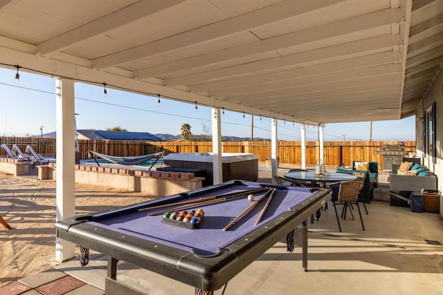 6636 Indian Cove Rd Unit 29, Palms, CA 92277 - fenced backyard with a patio and a hot tub