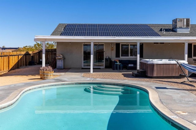6636 Indian Cove Rd Unit 29, Palms, CA 92277 - view of swimming pool featuring a hot tub, a patio area, and a fenced backyard