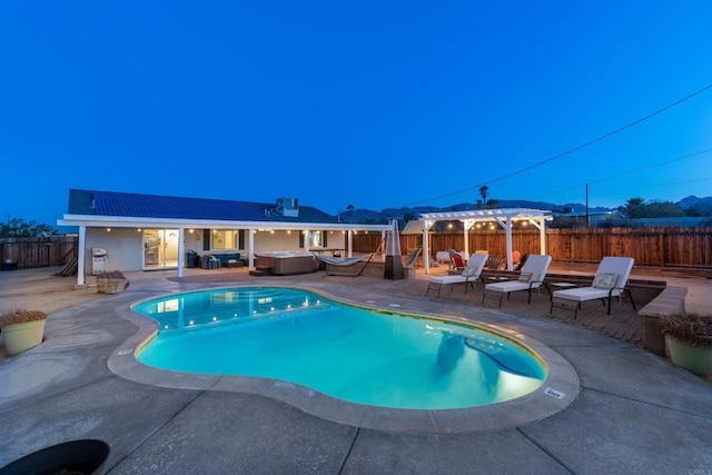 6636 Indian Cove Rd Unit 29, Palms, CA 92277 - view of pool with a hot tub, a fenced backyard, a patio area, and an outdoor living space