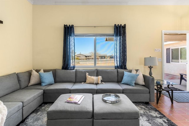 6636 Indian Cove Rd Unit 29, Palms, CA 92277 - living area featuring plenty of natural light, crown molding, and tile patterned flooring