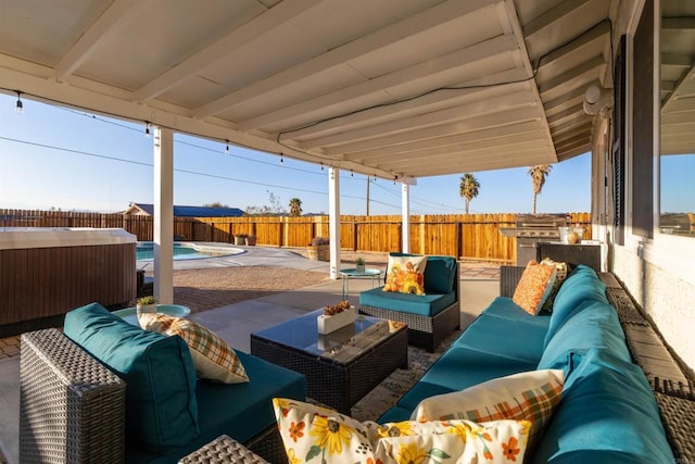 6636 Indian Cove Rd Unit 29, Palms, CA 92277 - fenced backyard with outdoor lounge area and a patio area