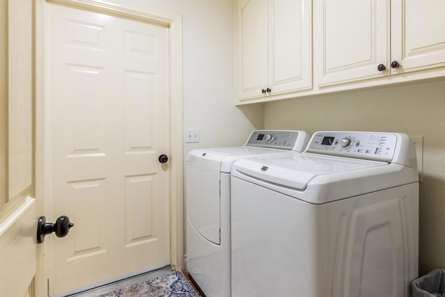 6636 Indian Cove Rd Unit 29, Palms, CA 92277 - laundry room featuring washer and clothes dryer and cabinet space