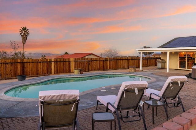 6636 Indian Cove Rd Unit 29, Palms, CA 92277 - view of pool featuring a patio, a fenced backyard, and grilling area