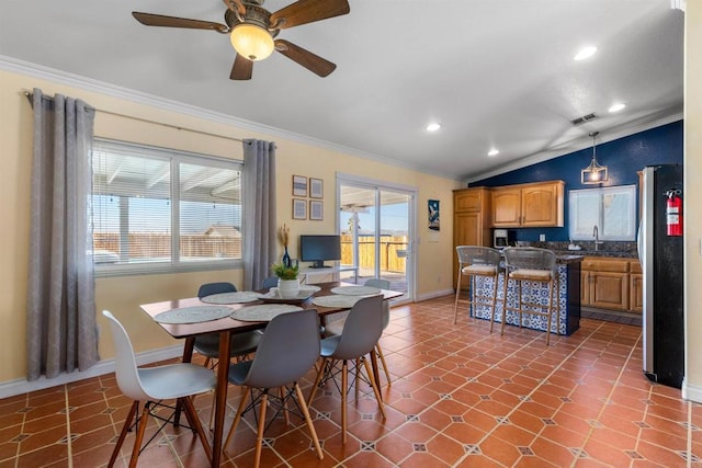 6636 Indian Cove Rd Unit 29, Palms, CA 92277 - dining area featuring crown molding, vaulted ceiling, ceiling fan, and recessed lighting