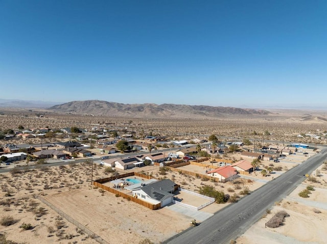 6636 Indian Cove Rd Unit 29, Palms, CA 92277 - aerial perspective of suburban area featuring mountains and a desert landscape