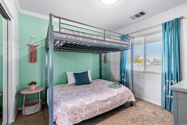6636 Indian Cove Rd Unit 29, Palms, CA 92277 - bedroom with carpet floors, crown molding, and a closet