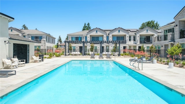 480 W Balsam Ln, Clovis, CA 93611 - community pool featuring a patio and a residential view