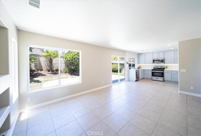 26932 St Julian Cir, Murrieta, CA 92563 - unfurnished living room featuring light tile patterned floors and recessed lighting