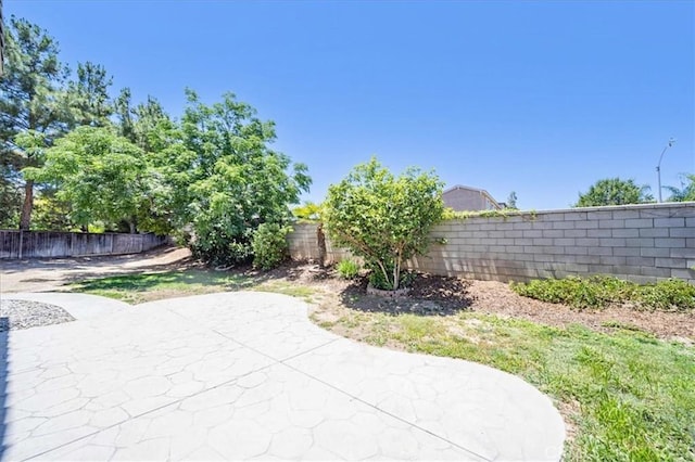 26932 St Julian Cir, Murrieta, CA 92563 - fenced backyard featuring a patio area