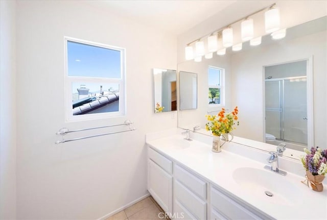 26932 St Julian Cir, Murrieta, CA 92563 - full bath with a shower with door, double vanity, and tile patterned flooring