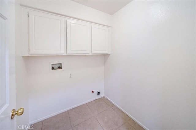26932 St Julian Cir, Murrieta, CA 92563 - laundry area with cabinet space, hookup for a washing machine, light tile patterned flooring, and hookup for a gas dryer