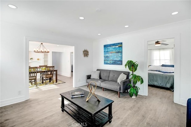 5737 5th, Los Angeles, CA 90043 - living area with light wood finished floors, a chandelier, recessed lighting, and ceiling fan