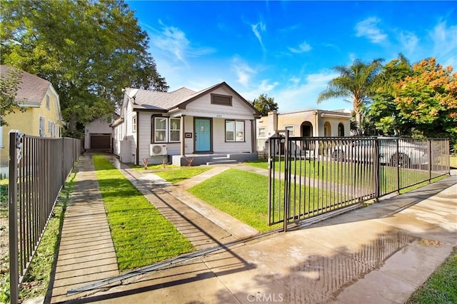 5737 5th, Los Angeles, CA 90043 - bungalow-style house with a fenced front yard, driveway, and a gate