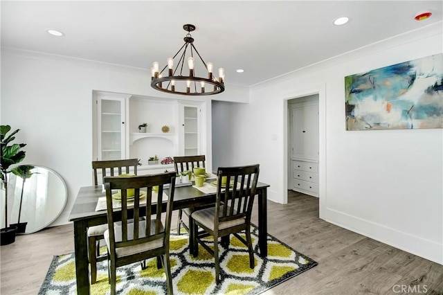 5737 5th, Los Angeles, CA 90043 - dining area featuring ornamental molding, a chandelier, light wood finished floors, and recessed lighting