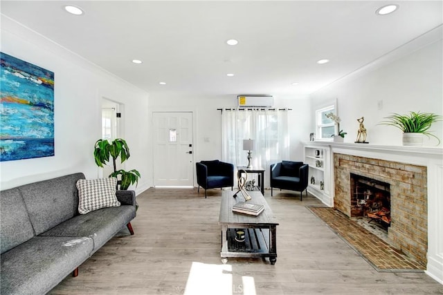 5737 5th, Los Angeles, CA 90043 - living area with recessed lighting, ornamental molding, light wood-type flooring, and a fireplace with flush hearth