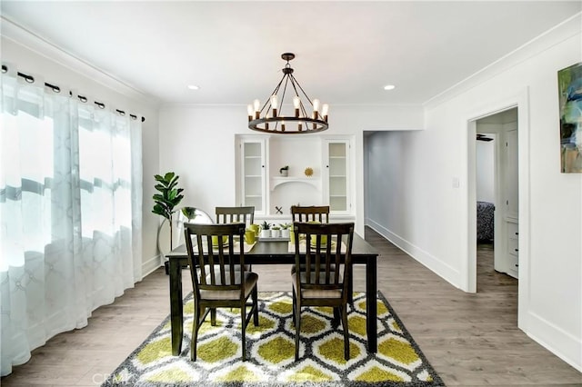 5737 5th, Los Angeles, CA 90043 - dining space with a chandelier, crown molding, wood finished floors, and recessed lighting