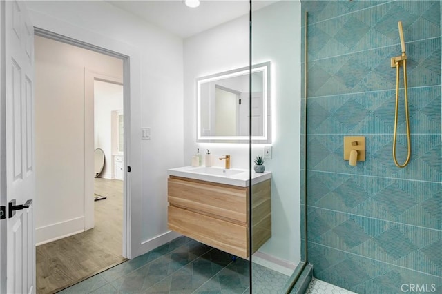 5737 5th, Los Angeles, CA 90043 - bathroom featuring a stall shower, vanity, and tile patterned flooring