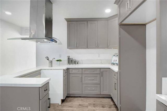 5737 5th, Los Angeles, CA 90043 - kitchen featuring island range hood, gray cabinets, and a peninsula