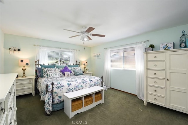 25355 Auld Ave, Hemet, CA 92544 - bedroom featuring multiple windows, dark carpet, and a ceiling fan