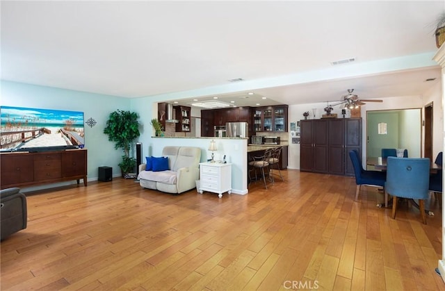 25355 Auld Ave, Hemet, CA 92544 - living room with light wood-style flooring and a ceiling fan