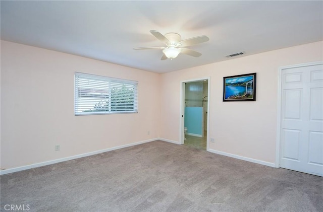 25355 Auld Ave, Hemet, CA 92544 - unfurnished bedroom featuring carpet flooring, ensuite bathroom, and ceiling fan