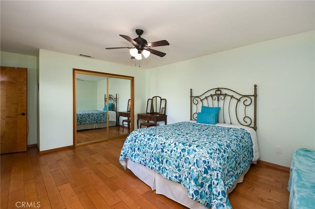 25355 Auld Ave, Hemet, CA 92544 - bedroom with a closet, wood finished floors, and a ceiling fan