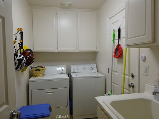 43890 Moccasin Pl, Lancaster, CA 93536 - laundry area featuring washing machine and clothes dryer and cabinet space