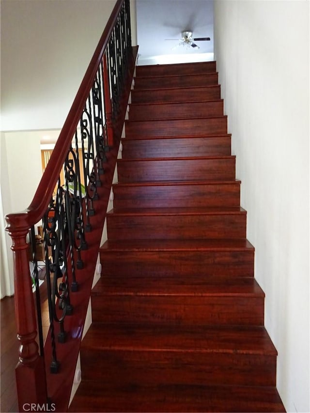 43890 Moccasin Pl, Lancaster, CA 93536 - staircase featuring ceiling fan and wood finished floors