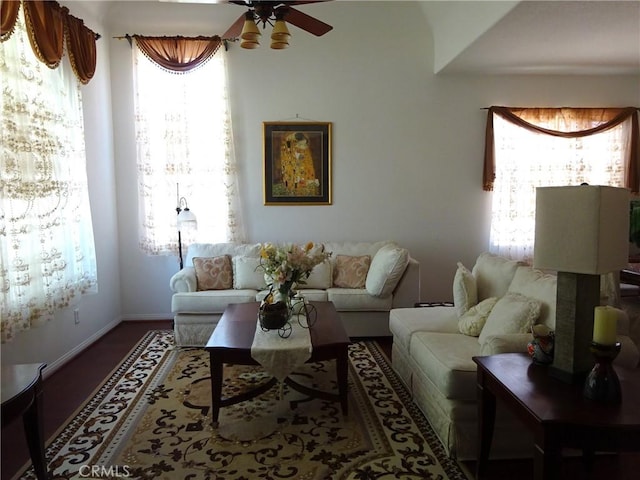 43890 Moccasin Pl, Lancaster, CA 93536 - living area featuring healthy amount of natural light and a ceiling fan