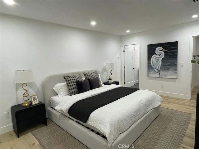 20406 Londelius St, Winnetka, CA 91306 - bedroom featuring light wood finished floors and recessed lighting