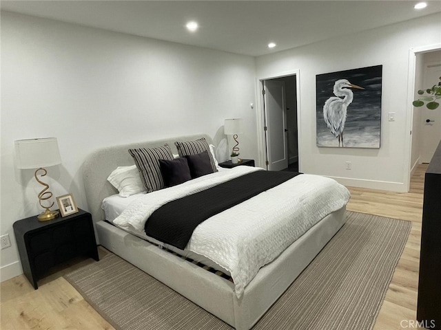 20406 Londelius St, Winnetka, CA 91306 - bedroom featuring light wood-style flooring and recessed lighting