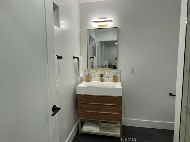 20406 Londelius St, Winnetka, CA 91306 - bathroom with vanity and decorative backsplash