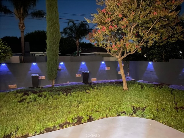 20406 Londelius St, Winnetka, CA 91306 - yard at twilight with a lawn