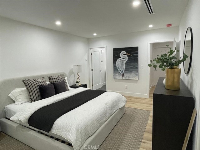 20406 Londelius St, Winnetka, CA 91306 - bedroom featuring light wood-type flooring and recessed lighting
