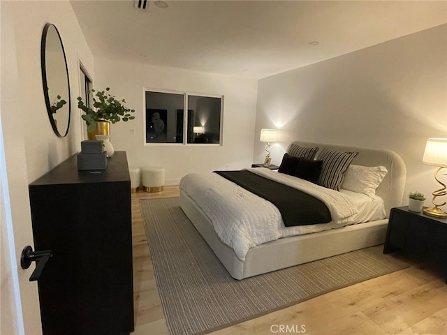 20406 Londelius St, Winnetka, CA 91306 - bedroom with light wood-style floors